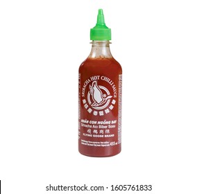 Warsaw / Poland - January 1 2020: Sriracha Sauce Bottle Isolated On White Background.