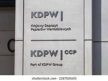 Warsaw, Poland - July 2022: Lettering "Krajowy Depozyt Papierow Wartosciowych" (Central Securities Depository of Poland) on a facade of a building of Stock Exchange Center. Selected focus.