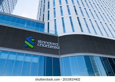 Warsaw, Poland - July 27, 2021: View at Standard Chartered logotype on the office