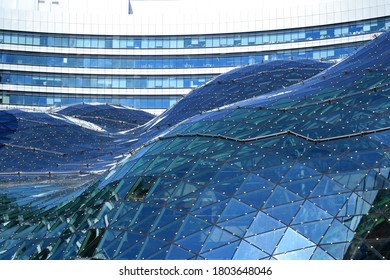 Warsaw, Poland - July 31 2020: Zlote Tarasy (Golden Terraces) Modern Facade Details. Shopping Mall Located In The Center Of Warsaw, Next To Warszawa Centralna Railway  Station