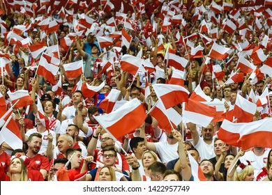WARSAW, POLAND - JUNE 10, 2019: Qualifications Euro 2020  match Poland - Israel 4:0. Supporters of Poland waveing national flags.