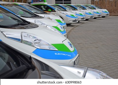 Warsaw, Poland - March, 01, 2017: Electric Taxi Cars Parking In A Row.