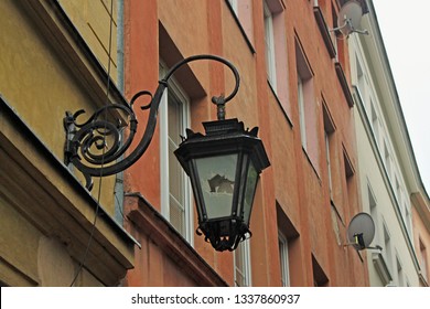 WARSAW, POLAND - MAY 12, 2012: Broken Streetlight On The One Of Old Buildings In Historical Center Of Warsaw.