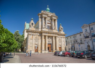 WARSAW, POLAND - MAY, 2018: Cityscape. Walking Warsaw Streets. Church Of The Assumption Of The Virgin Mary And St. Joseph (Carmelite Church) In Warsaw, Poland.