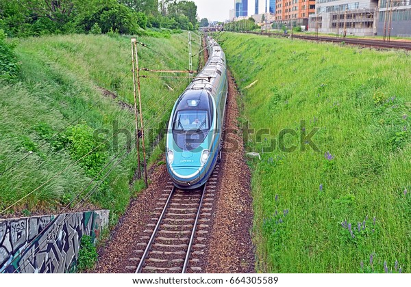 WARSAW, POLAND - MAY 30 - Alstom Pendolino\
long-distance train, serving the routes of PKP Intercity\
long-distance operator, on May 30, 2016 in Warsaw,\
Poland