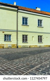 Warsaw, Poland - May 31, 2018:  Arsenal building and restored fragment of the old Nalewki Street, today Ghetto Heroes Street.