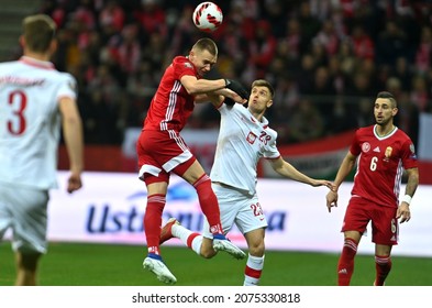 WARSAW, POLAND - NOVEMBER 15, 2021: World Cup 22 Qatar Qualification Gropup Stage Match Poland - Hungary, Attila Szalai (Hungary) Krzysztof Piatek (Poland) 