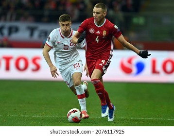 WARSAW, POLAND - NOVEMBER 15, 2021: World Cup 22 Qatar Qualification Gropup Stage Match Poland - Hungary, Krzysztof Piatek (Poland) Attila Szalai (Hungary) 