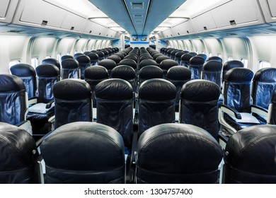 WARSAW / POLAND, NOVEMBER 16, 2014: Plane board of Boeing 767, inside empty plane, row of seats in economy and business class