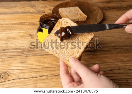 Warsaw, Poland, October 30, 2023: Marmite Yeast Spread, Vegemite Spread, Australian Healthy Breakfast, Traditional English Black Beer Yeast Extract, Toast Food Paste, Marmite Spread, Editorial Image