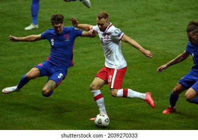 WARSAW, POLAND - September 08, 2021: World Cup 2022 Qatar Qualification Gropu Stage Poland - England, John Stones (England) Tymoteusz Puchacz (Poland) 