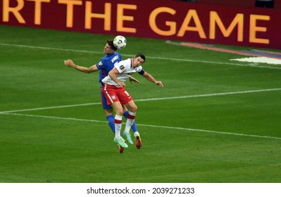 WARSAW, POLAND - September 08, 2021: World Cup 2022 Qatar Qualification Gropu Stage Poland - England, John Stones (England) Robert Lewandowski (Poland) 