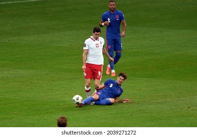 WARSAW, POLAND - September 08, 2021: World Cup 2022 Qatar Qualification Gropu Stage Poland - England, Robert Lewandowski (Poland) John Stones (England) 