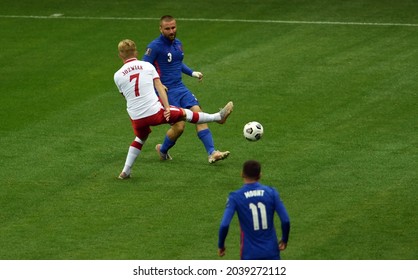 WARSAW, POLAND - September 08, 2021: World Cup 2022 Qatar Qualification Gropu Stage Poland - England, Kamil Jozwiak (Poland) Kyle Walker (England) 