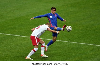 WARSAW, POLAND - September 08, 2021: World Cup 2022 Qatar Qualification Gropu Stage Poland - England, Jan Bednarek (Poland) Mason Mount (England) 