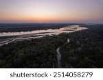 Warsaw, Poland - September 7, 2024: Record low water level of the Vistula River in Poland, numerous islands and sandbars revealed by low water levels, global warming, side tributary of a small river, 