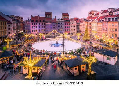 Warsaw, Poland - Skating rink and Christmas Market in the Old Town Square, Ryenek famous place. - Powered by Shutterstock