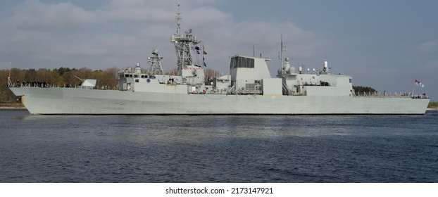 WARSHIP - A Canadian Navy Frigate Sails To The Port