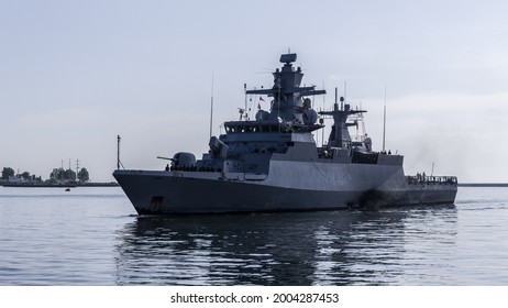 
WARSHIP - A German Navy ship is maneuvering in a port 