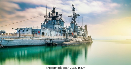 warship and submarine view. navy forces at sea. warship that provided maritime control of states. protection of state borders from the sea. Dramatic view of warship and submarine.