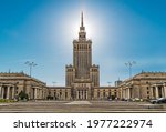 In Warszaw skyline, The Palace of Culture and Science, one of the main symbols of Warsaw skyline, Poland. Blue sky, clean style. 
