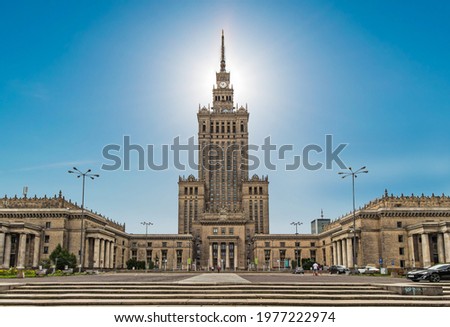 In Warszaw skyline, The Palace of Culture and Science, one of the main symbols of Warsaw skyline, Poland. Blue sky, clean style. 
