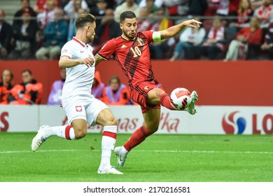 WARSZAWA, POLAND - JUNE 14, 2022: UEFA Nations League division A group 4 match Poland vs Belgium 0:1. In action Matty Cash (L) and Eden Hazard (R).