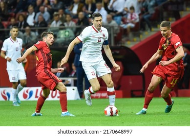 WARSZAWA, POLAND - JUNE 14, 2022: UEFA Nations League division A group 4 match Poland vs Belgium 0:1. In action Robert Lewandowski (9) Leander Dendoncker (19).