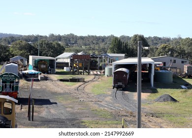 Warwick, Queensland, Australia - April 8 2022: Railway yard and station in the Queensland town of Warwick in Southern Downs Region, featuring buildings, silos and carriages.
