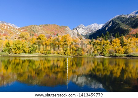 Wasatch Mountains reflected in the lower Bells Canyon Reservoir near Sandy, Utah
