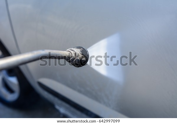 Wash car with soap and\
water