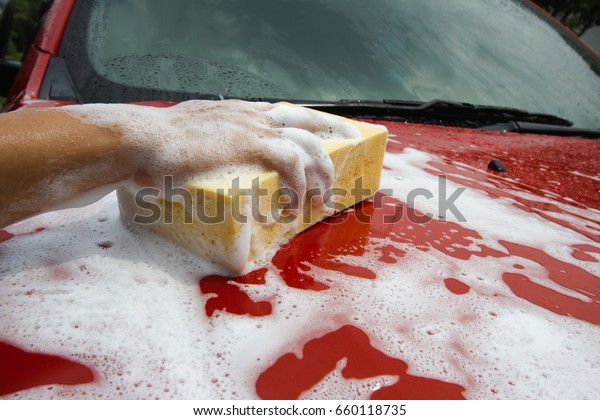 Wash the\
car with sponge and fully of foam shampoo.\
