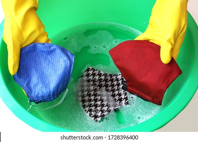 Wash And Clean Cloth Cotton Face Mask In The Water By Hand. Hand Washing. Prevention Methods During Coronavirus Covid 19.