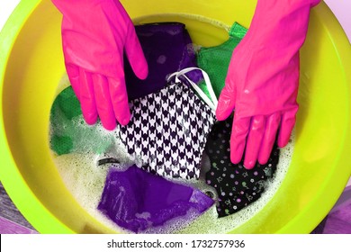 Wash And Clean Cloth Cotton Face Mask In The Water By Hand. Hand Washing. Prevention Methods During Coronavirus Covid 19.