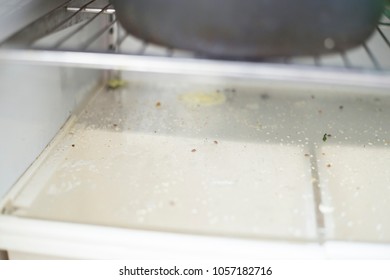 wash the dirty refrigerator - Shutterstock ID 1057182716