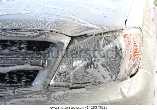 wash foam on Car
face