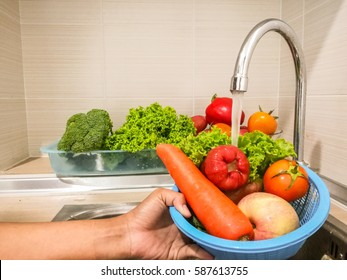 Wash fruits and vegetables, healthy concept.