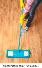 Wash wood floor mop. Housekeeping concept