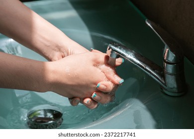 Wash your hands using hand sanitizer to kill germs that you might accidentally touch, such as the COVID-19 virus, before working or eating or doing other activities.