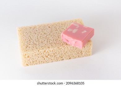 Washcloth Massage For The Body. Foam Sponge And Pink Soap. Washcloth Sea Sponge. Eco-friendly Concept