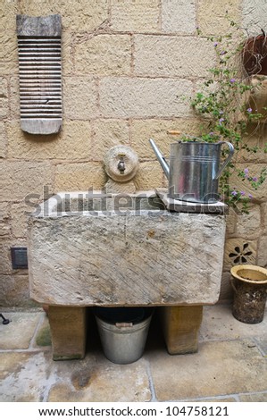 Washhouse with tools.