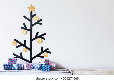 Washi tape christmas tree decoration with tiny colorful gifts. Christmas gifts. DIY. - Powered by Shutterstock