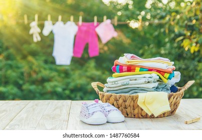 Washing Baby Clothes. Linen Dries In The Fresh Air. Selective Focus. Nature.