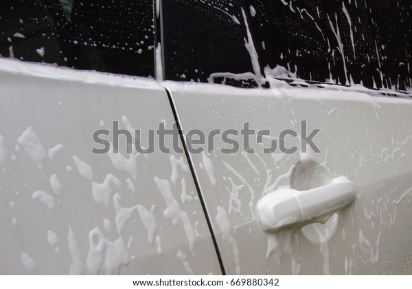 Washing car and fully of\
foam bubble.