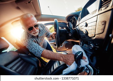 Washing Car. Senior Man Polishing His Car With Microfiber Cloth.