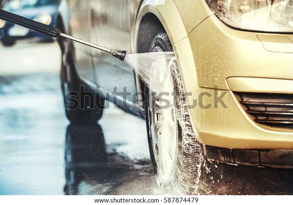 Washing car with soap.\
Close up concept.