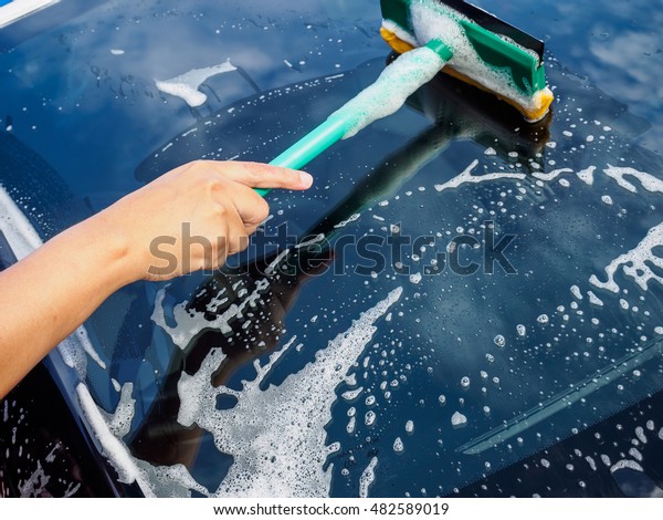 washing and clean car
window
