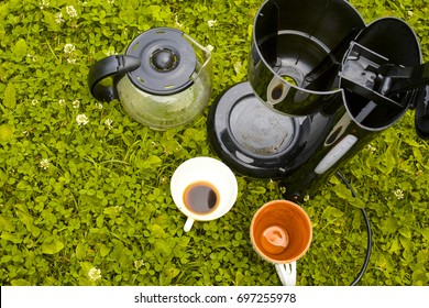 Washing Coffee Maker And Dirty Coffee Mugs On The Grass, Overhead Shot