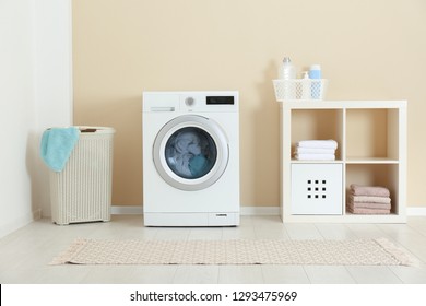 Washing Of Different Towels In Modern Laundry Room