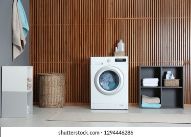 Washing Of Different Towels In Modern Laundry Room